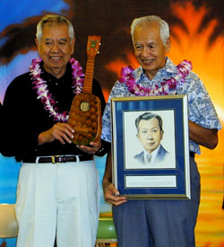 Fred and Sam Kamaka with the induction portrait of their father